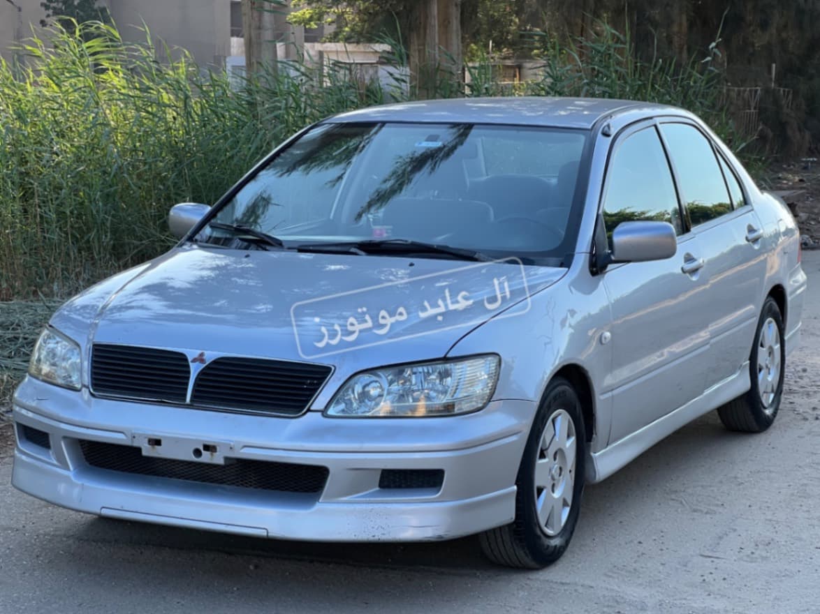 لانسر مكوى 2001 — صورة 1 من 13